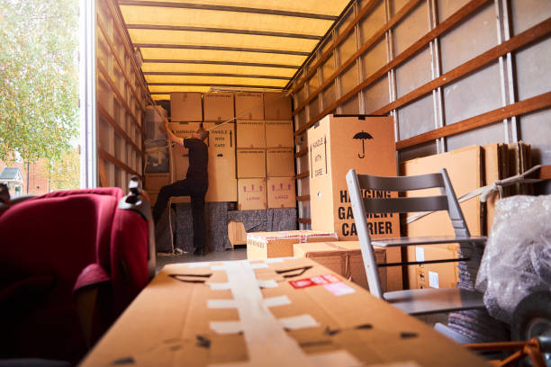 Removal company helping a family move out of their old home